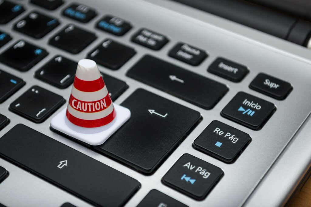 Image of traffic cone on computer keyboard
